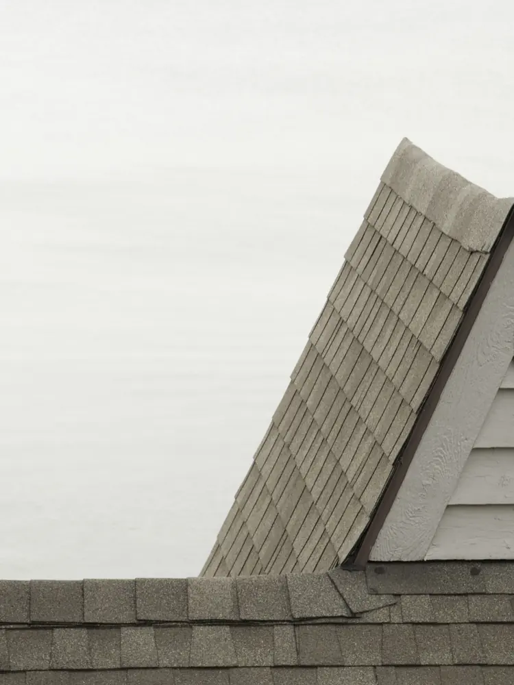 Wind damage shingle repair near the E-470 corridor in Aurora