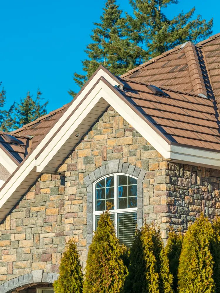 Concrete tile roof repair on an upscale Aurora home